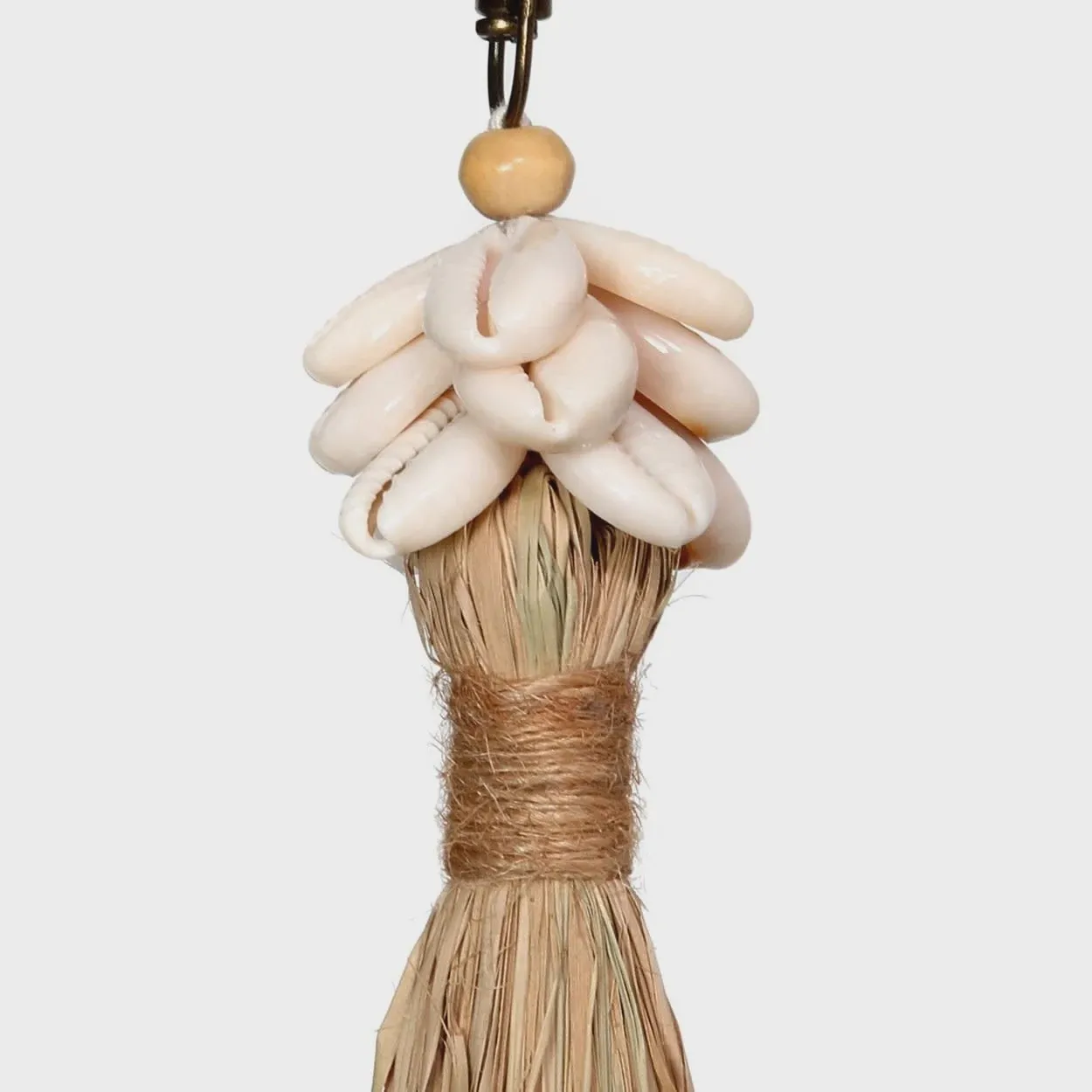 The Raffia Cowrie Shell Tassel