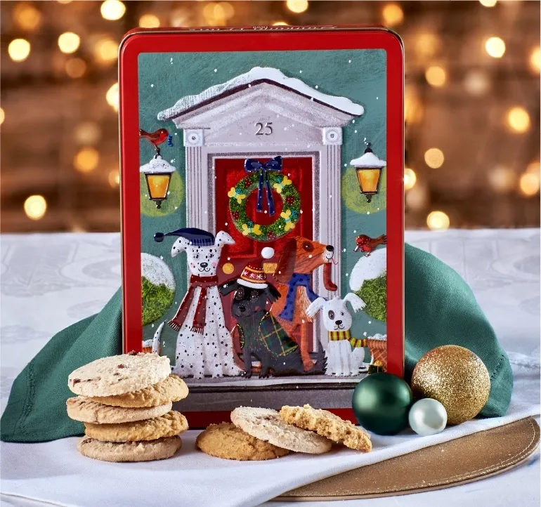 EMBOSSED SNOWY DOGS ON A DOORSTEP TIN 300GR