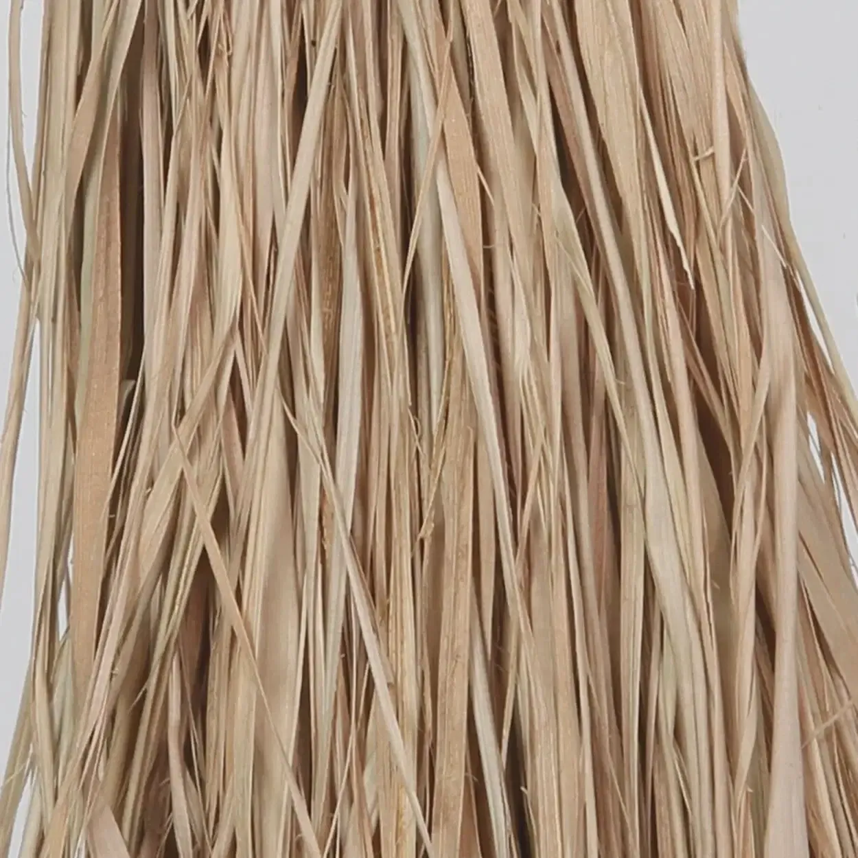 The Raffia Cowrie Shell Tassel