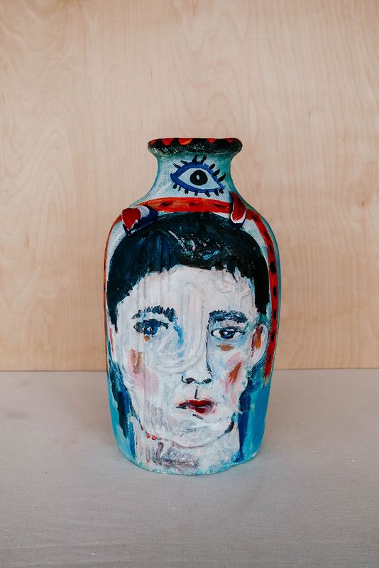 Boy with Blue Horns Vase