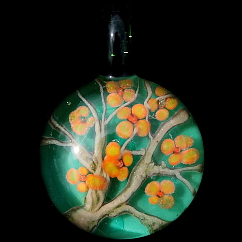 Orange Blooming Branch over Green