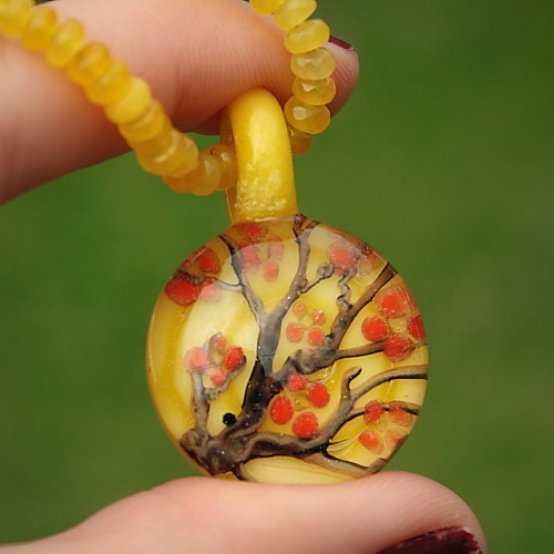 Orange/Red Blooming Branch over Yellow