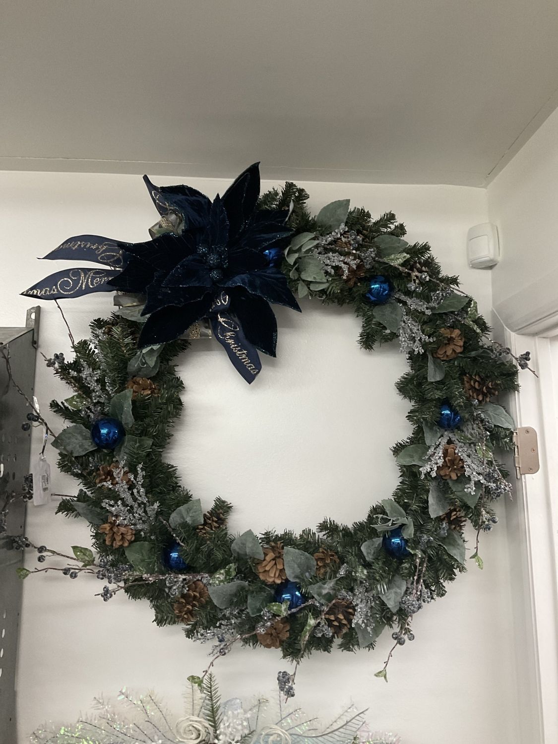 Wreath Evergreen with Blue Poinsettia, Blue Ornaments and Blue Merry Christmas Ribbon 34 inches