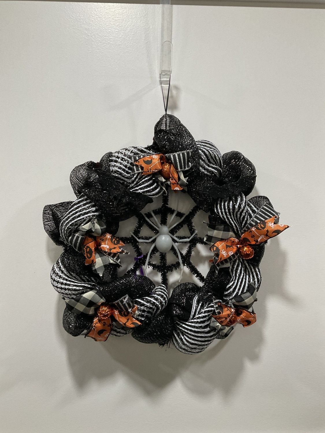 1322 Wreath Mesh Spider 18 in-Black and White Striped w/Orange Spooky Ribbon