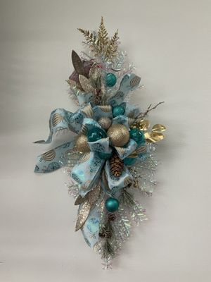 Swag Iridescent with Pinecones, Blue and Gold Ornaments and Ornament Ribbon