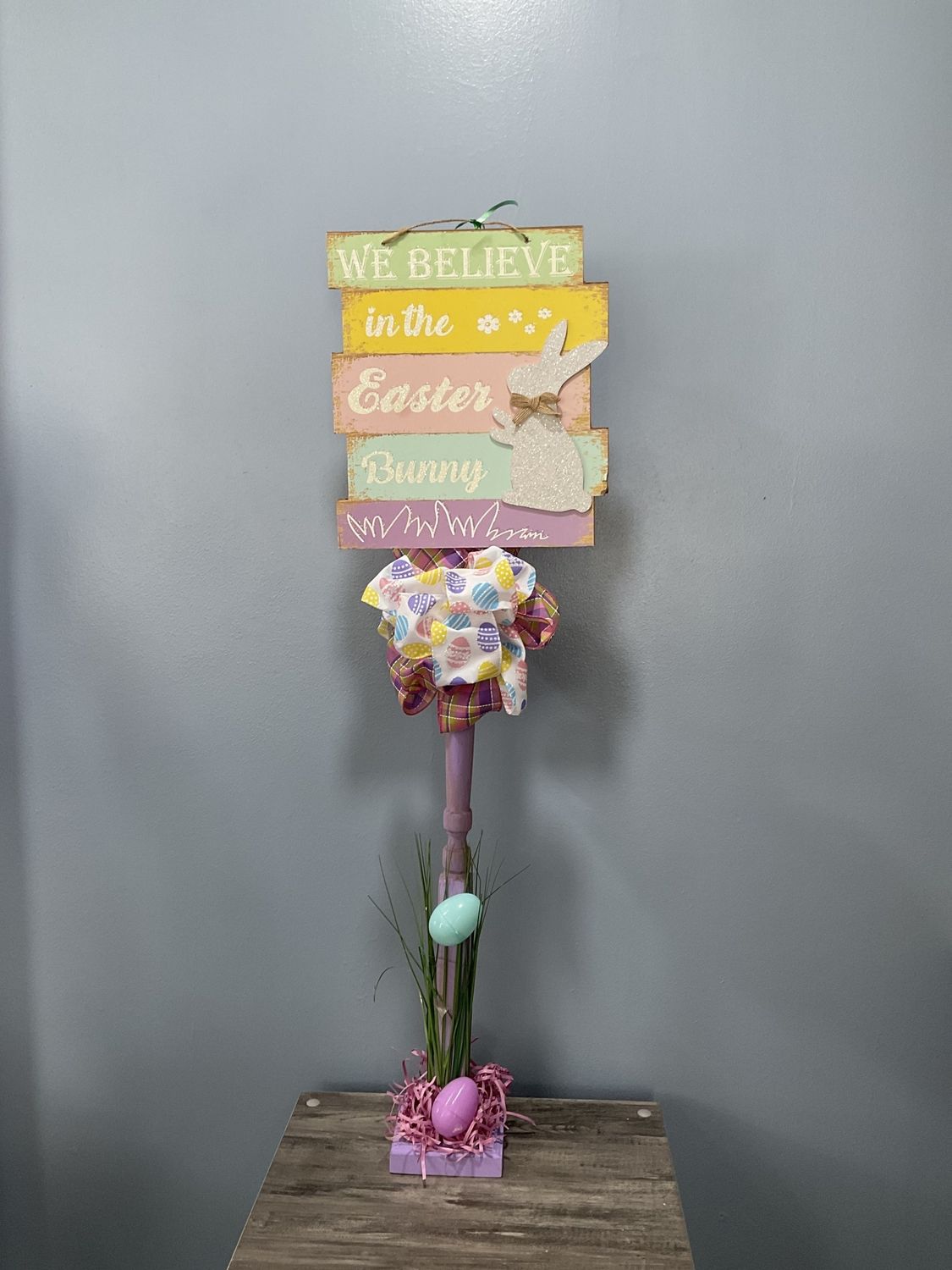 621 Standing Sign 37 in-Purple w/&quot;We Believe In The Easter Bunny&quot; and Pink Plaid and Egg Ribbons