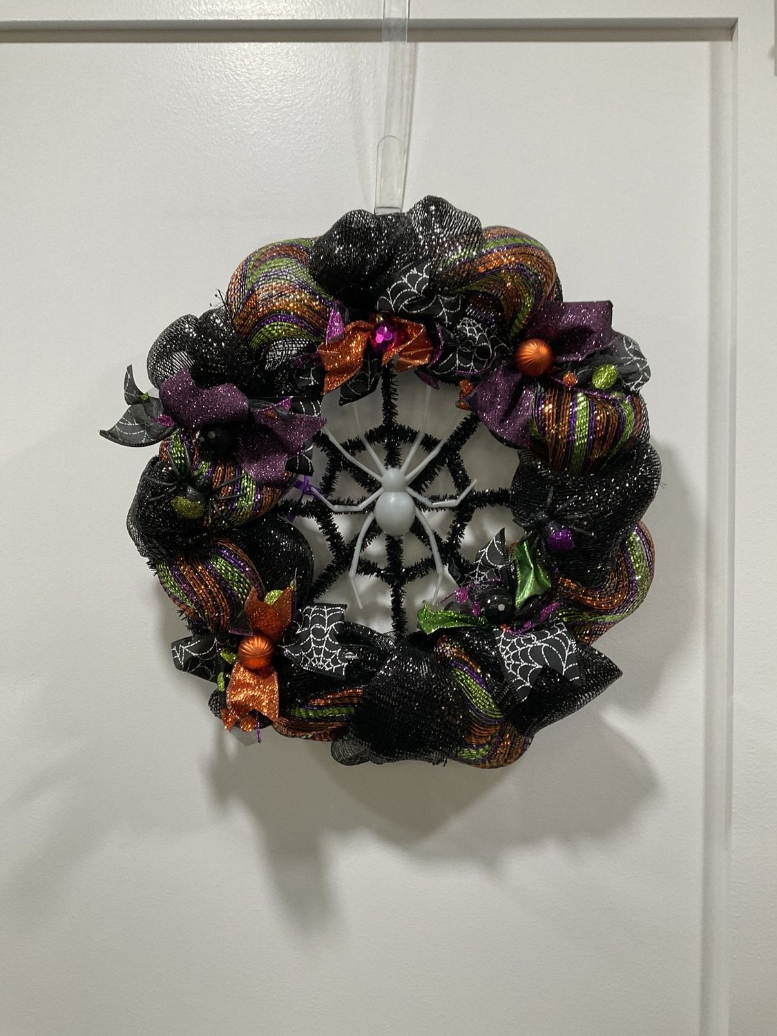 1318 Wreath Mesh Spider 18 in-Black and Multi Striped w/Black Web Ribbon and Purple Bows