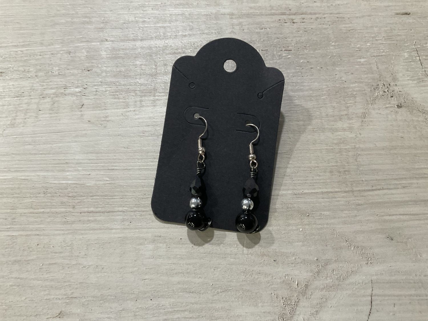 E212 Small Black Earrings
