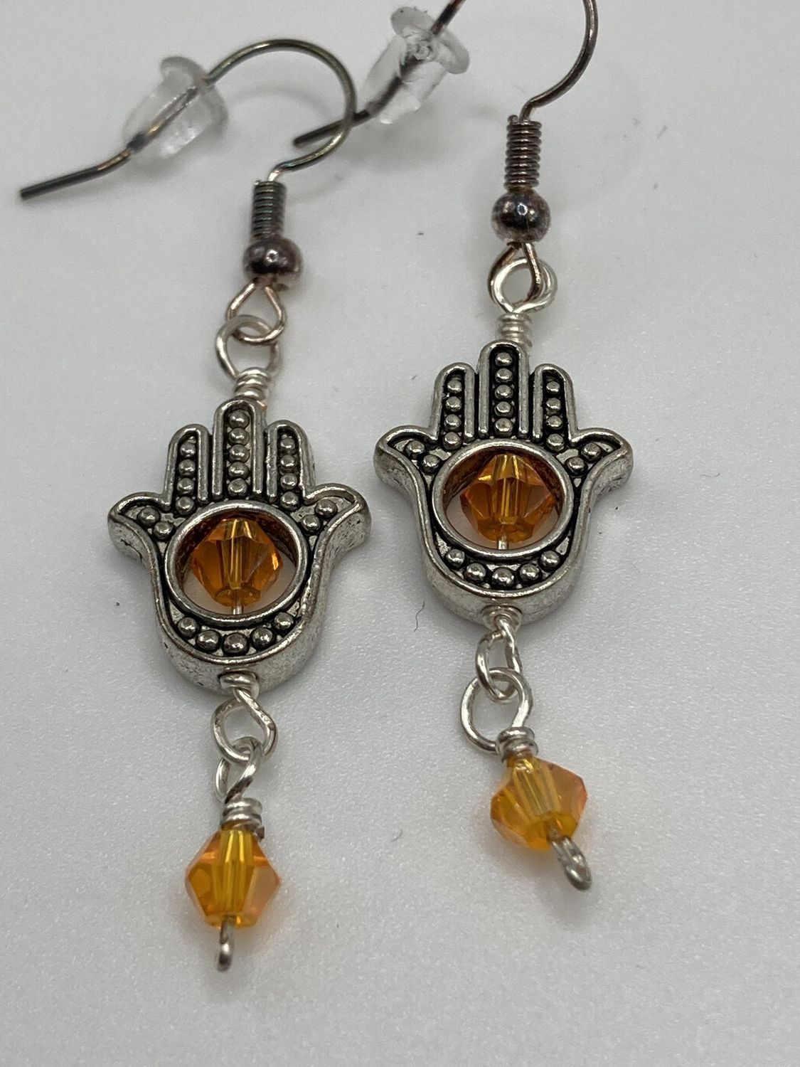 HE7  Orange Hamsa Earrings