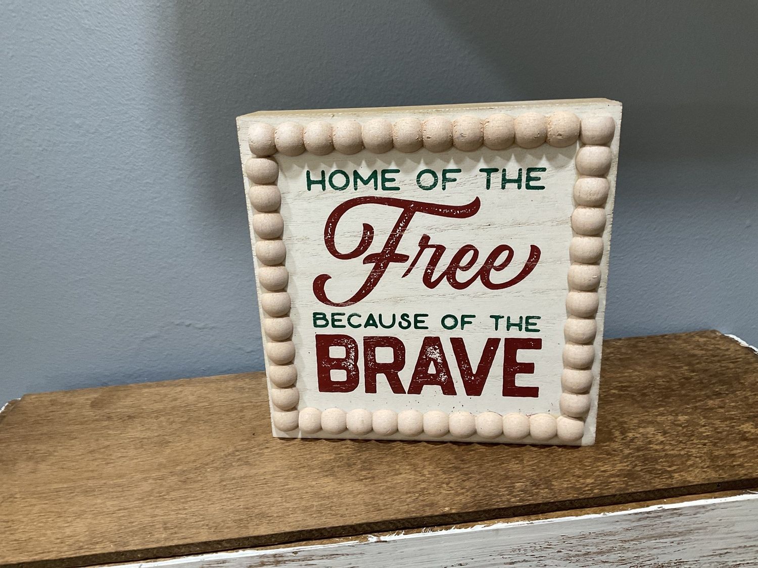 Sign &quot;Home of The Free Because of the Brave&quot;
