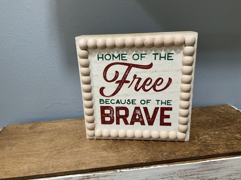 Sign &quot;Home of The Free Because of the Brave&quot;