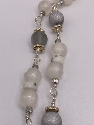 N208 Milky White Cat’s Eye with Silver Findings, Heishi Beads, and Silk Tassle in White, Shades of Turquoise Necklace