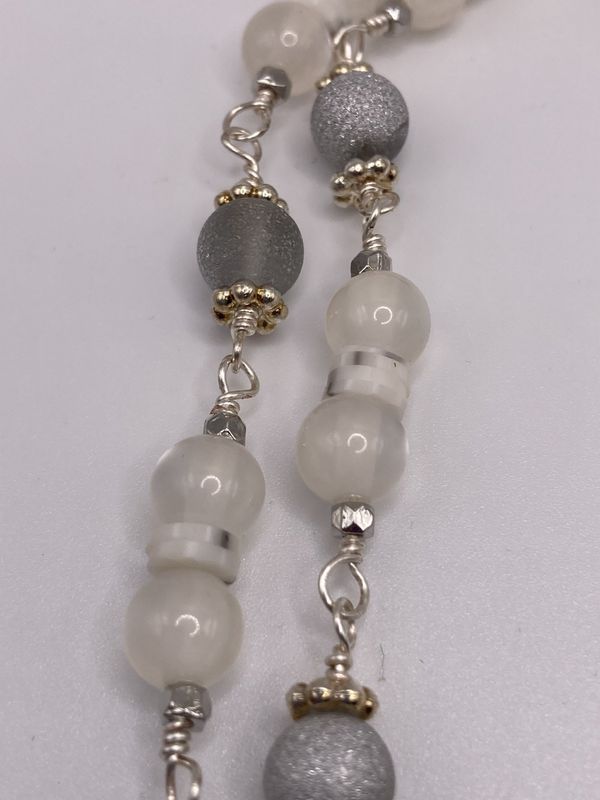 N208 Milky White Cat’s Eye with Silver Findings, Heishi Beads, and Silk Tassle in White, Shades of Turquoise Necklace