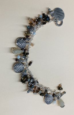 B003 Cha Cha Style Bracelet with Silver, Ivory,  Amber, Bronze, and White.