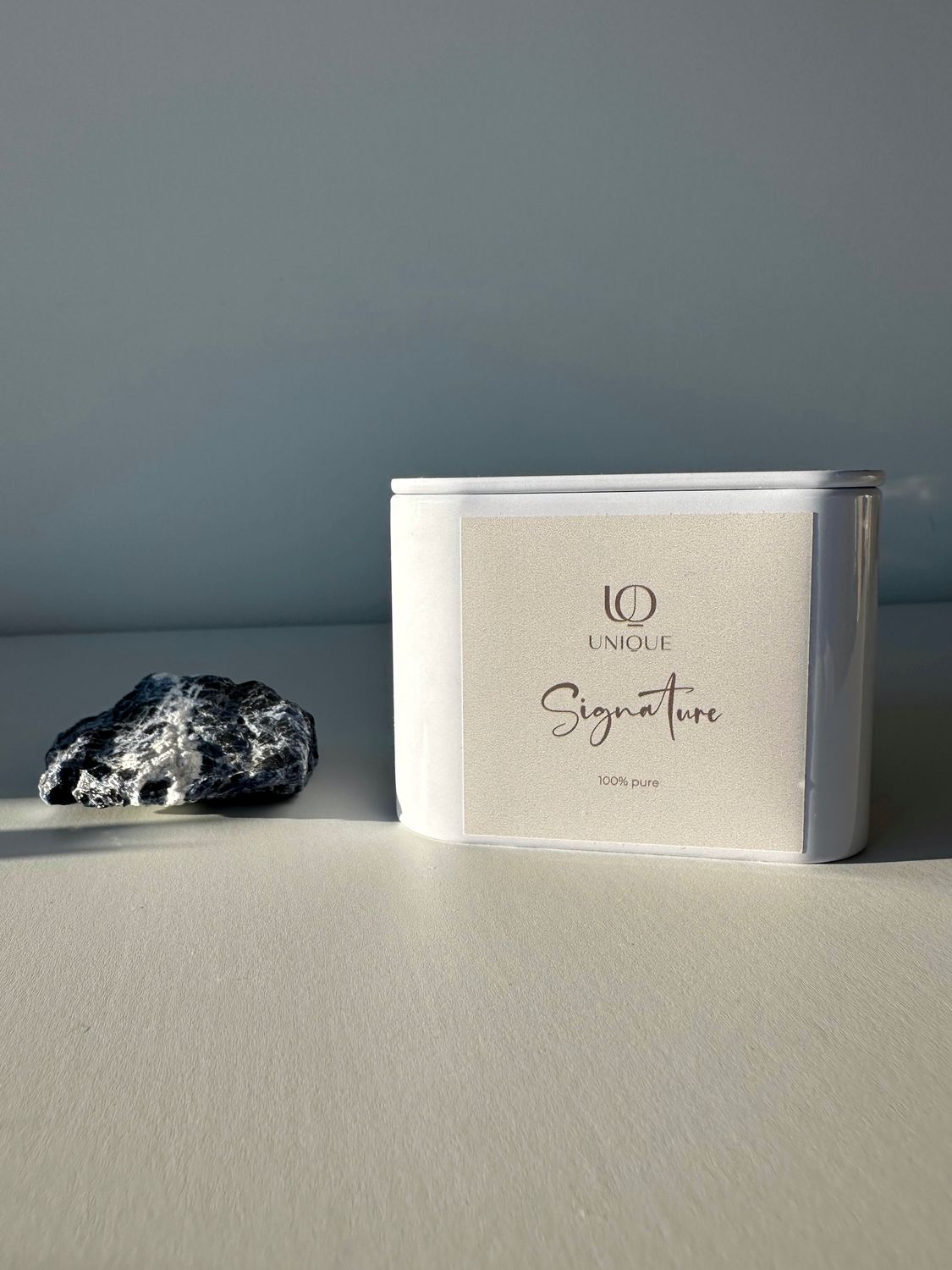 Soy candle in a white metal tin with lid. Fragrance &quot;Signature&quot;