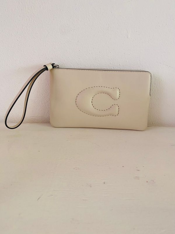 Muñequera COACH Hueso