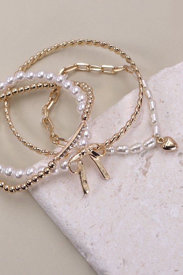 Gold Pearl and Bow Bangle Set