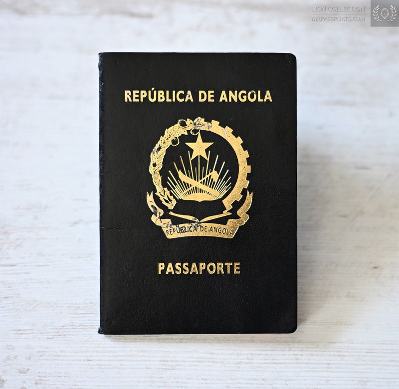 Angola, 2017 pre-biometric passport (latest type) w/ DR Congo label visa, no cuts