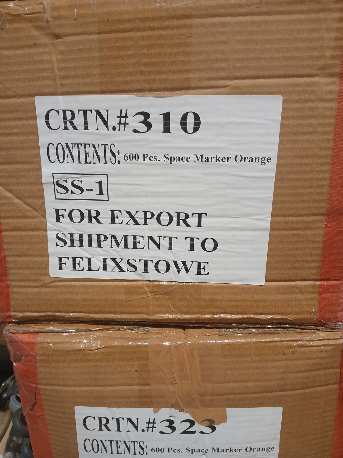 2 pallets 600 orange space markers (bay 14 middle)