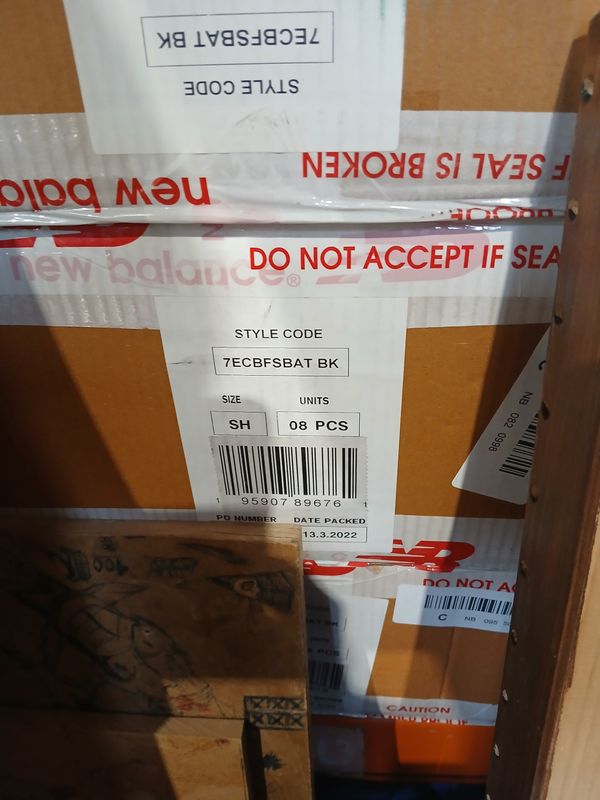 2 pallets of 8 cricket bats per box (middle of bay 13)