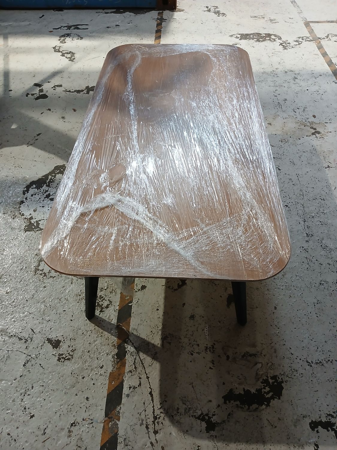 1 pallet a wooden topped table (bottom of bay 16)