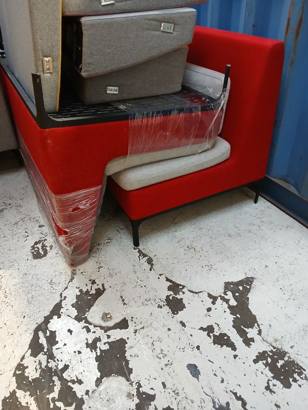 2 pallets of 2 red and grey sofas ( bottom of bay 16)