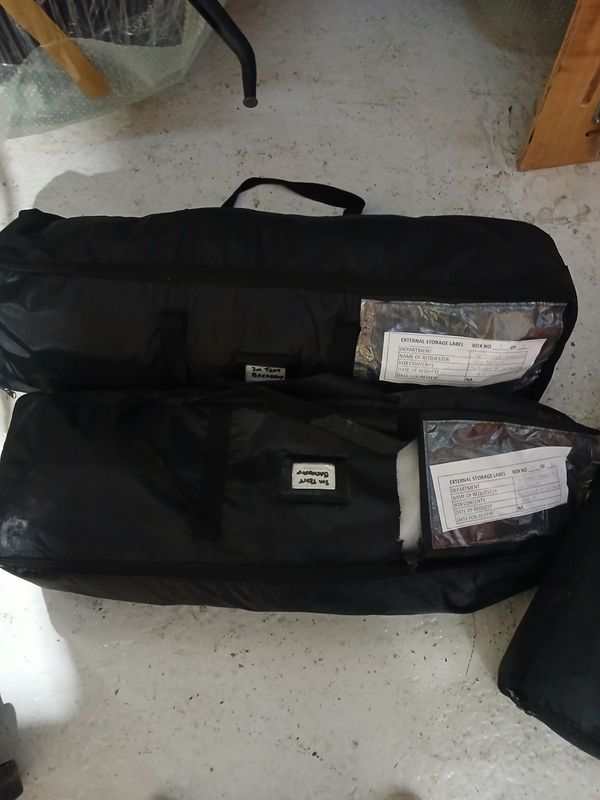 1 pallet of 2 bags of tents and accessories( bay 18 bottom corner)