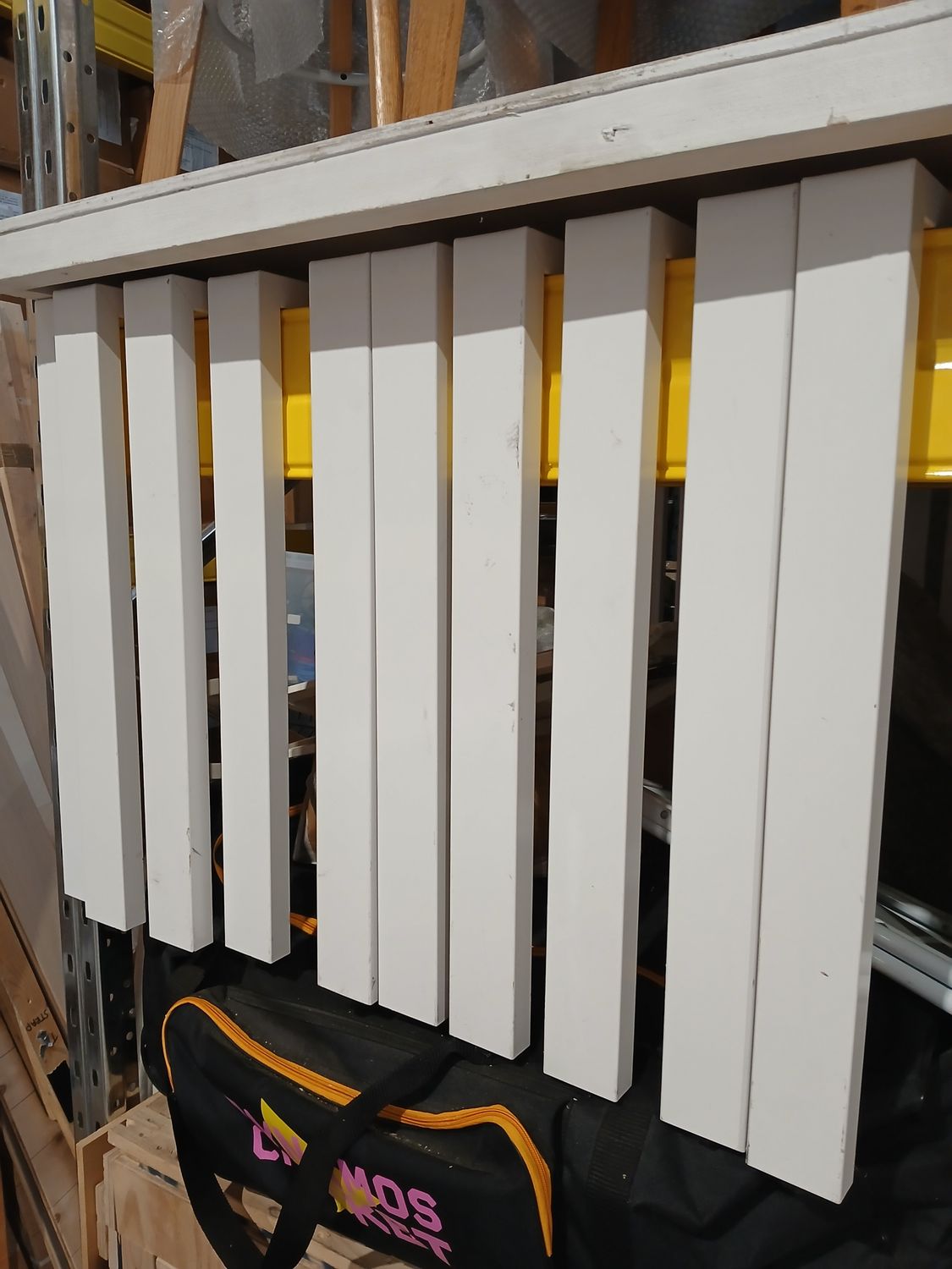 1 pallet of white metal table legs ( top of bay 11)