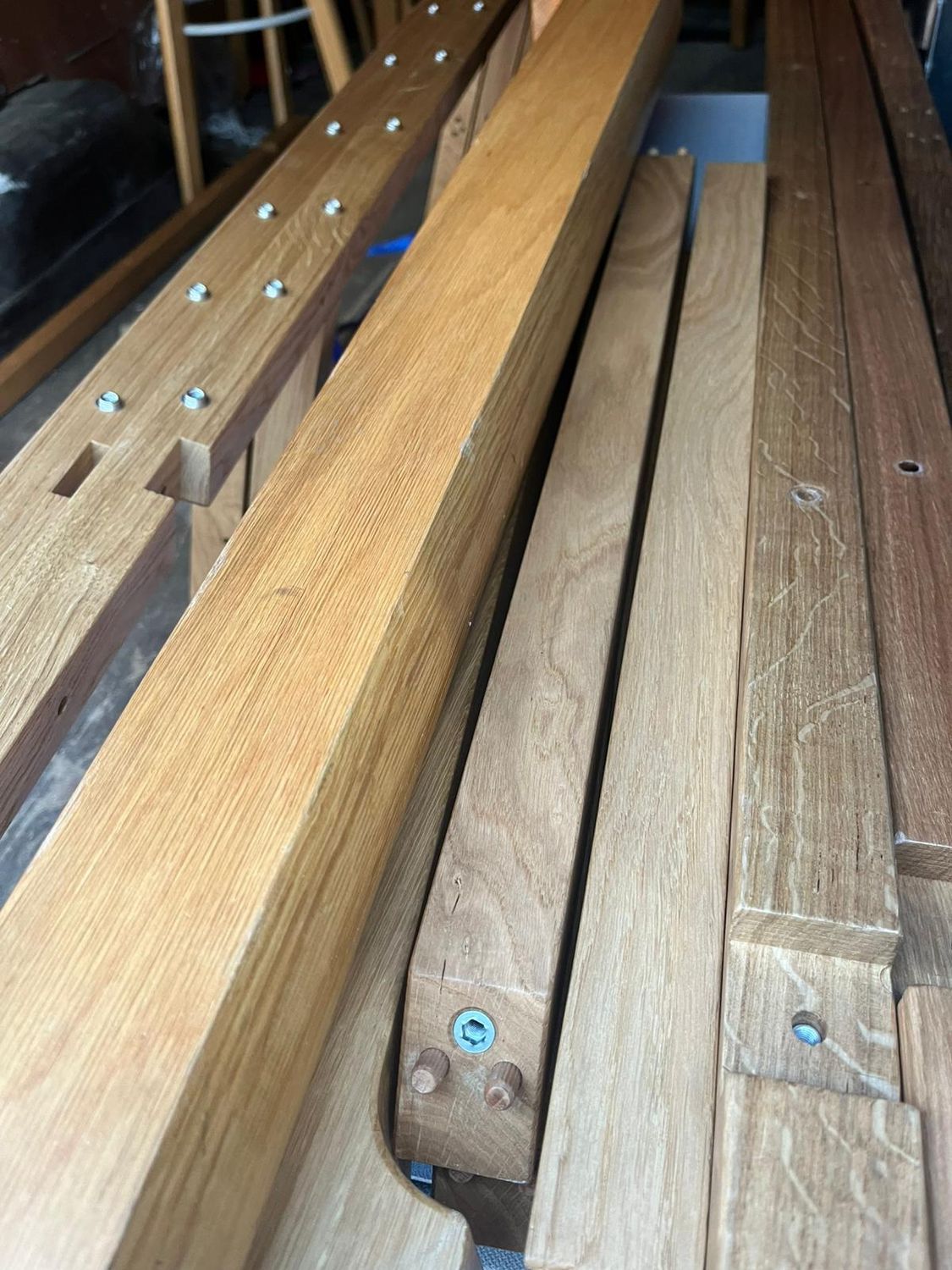 3 pallets of wooden tables legs and dividers ( top of bay 11)