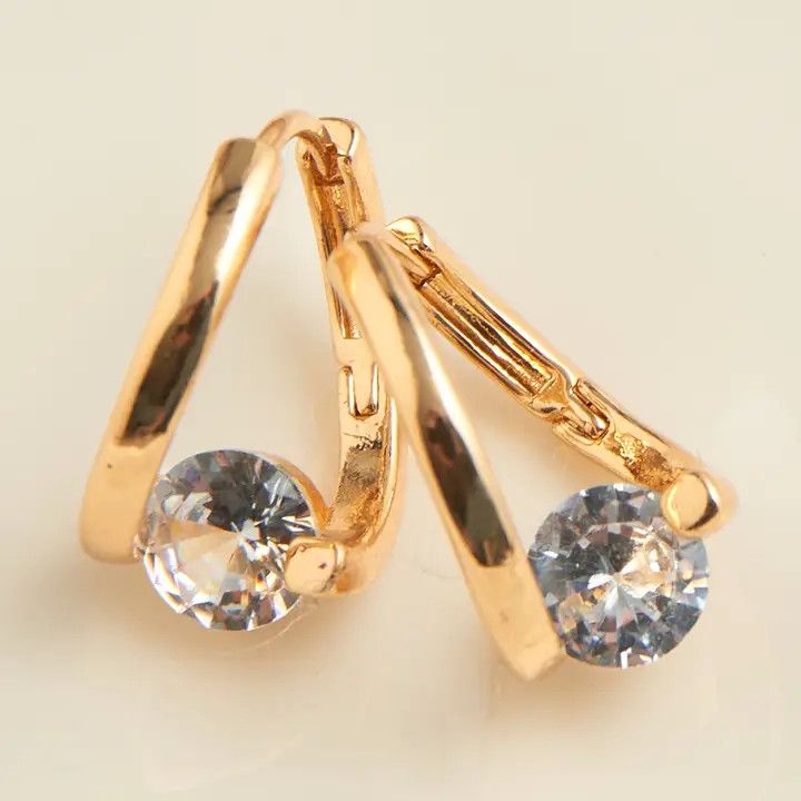 Dazzler Twisted Cubic Zirconia Hoop Earrings