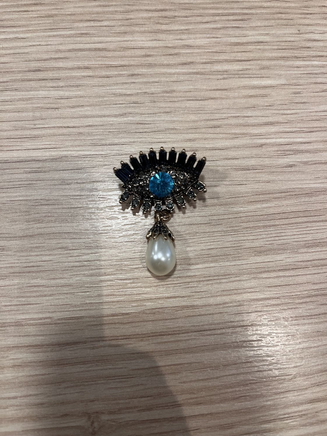 Pin oog met parel