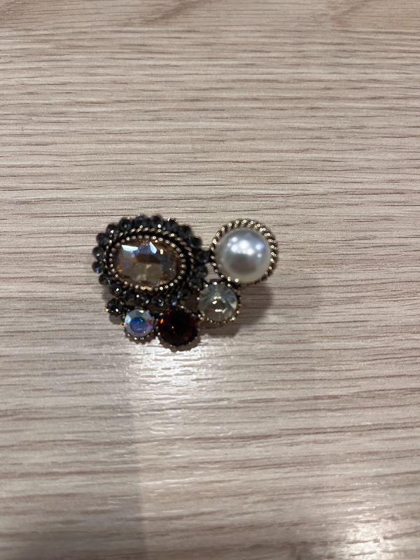 Pin goud oog