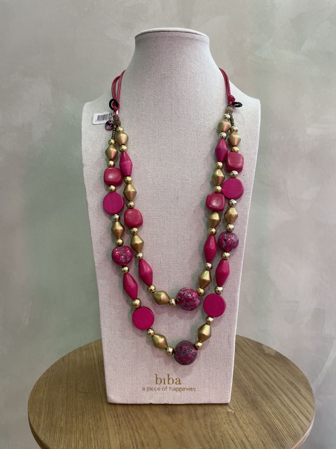 lang collier fuchsia/goud hout