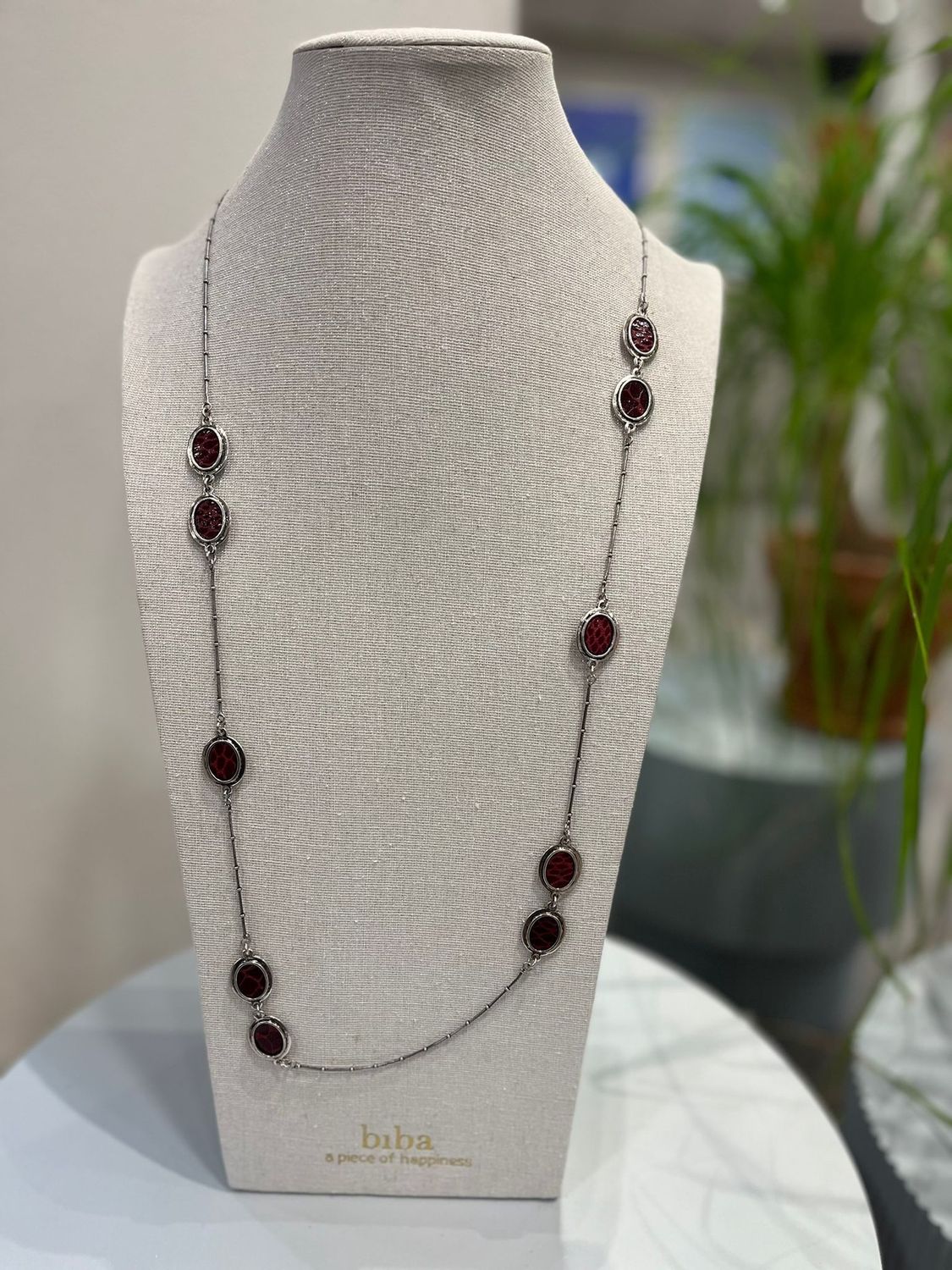 Ketting zilver met rode schakels