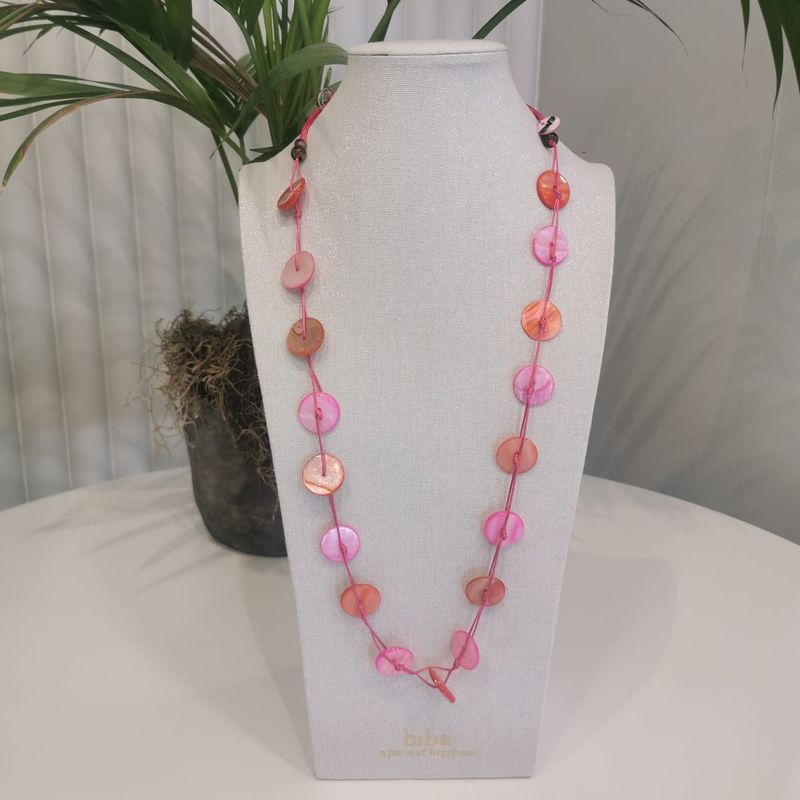 Lange ketting met roze en zalmkleurige schijfjes