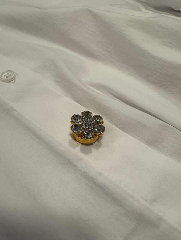 Knoop button