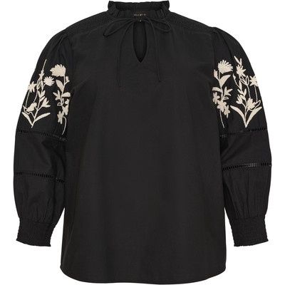 Shirt w flock embroidery on sleeves
