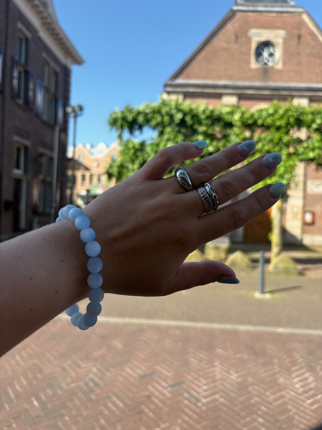 Armband kleine kralen licht blauw