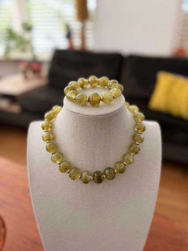 armband groen met klein goud ringetje