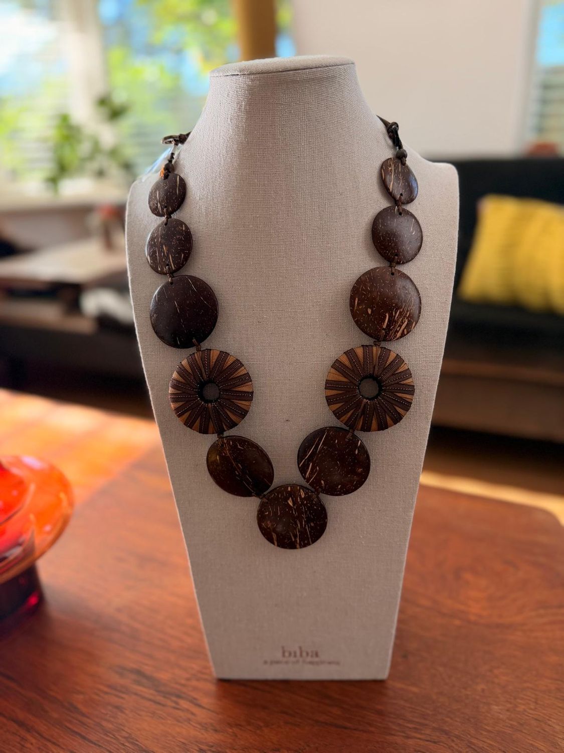 collier lang hout tinten cirkels met touw