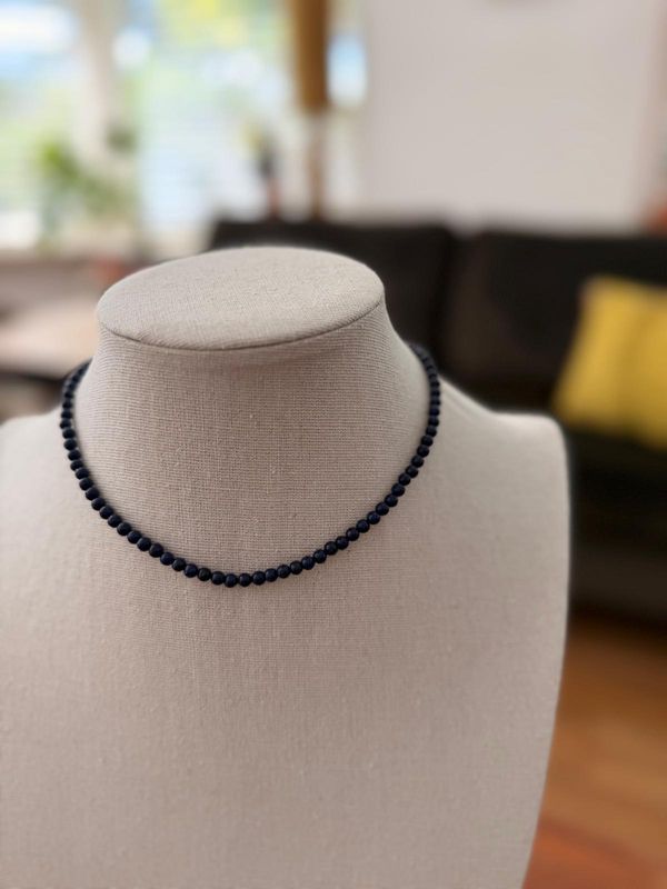 collier kort klein steenje blauw
