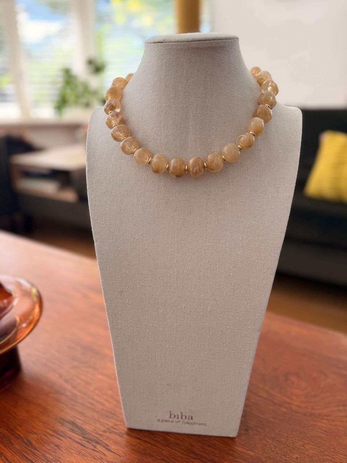 kort beige collier/16mm met klein goed ringtje