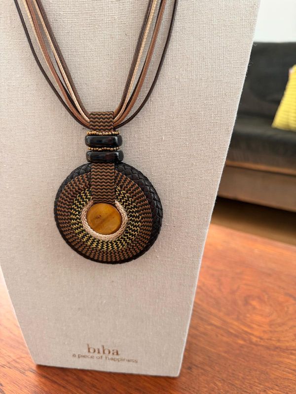 collier lang cirkel met touw bruin