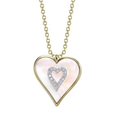 large mother of pearl heart neckace set in 14k yellow gold and featuring an accent heart within made of 0.04 carats of sparkling diamonds