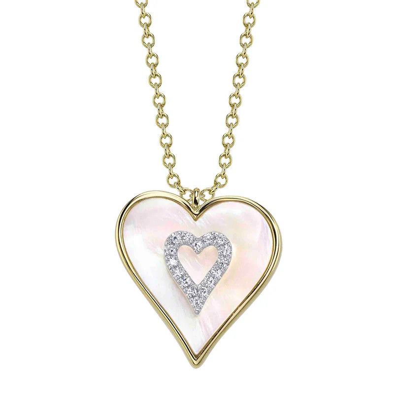 large mother of pearl heart neckace set in 14k yellow gold and featuring an accent heart within made of 0.04 carats of sparkling diamonds