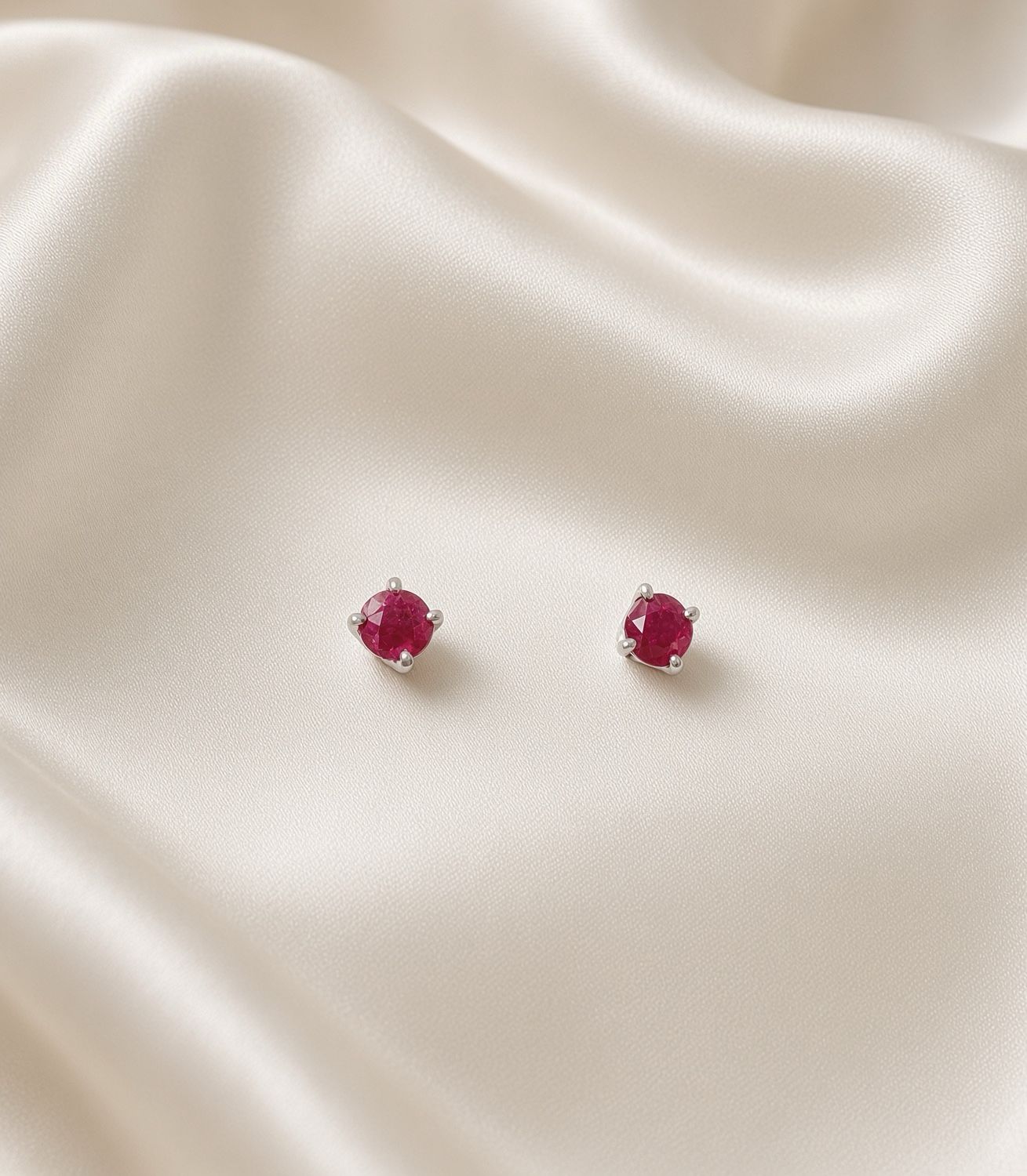14k W/G Ruby Stud Earrings,  R: 0.62ct