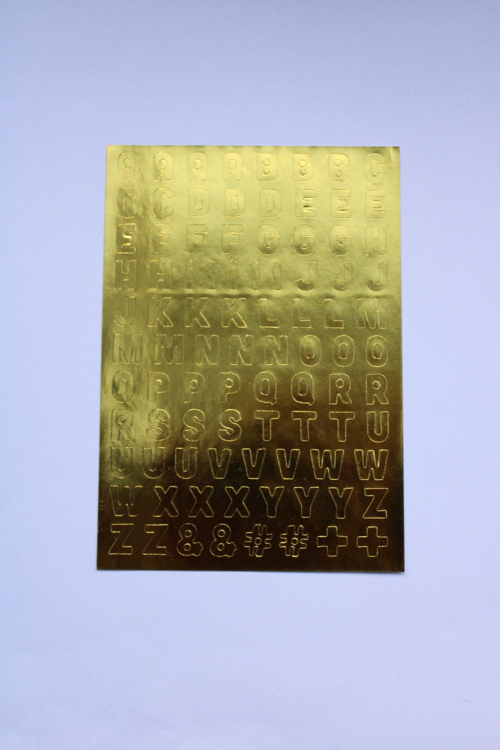Stickersheet met gouden letters