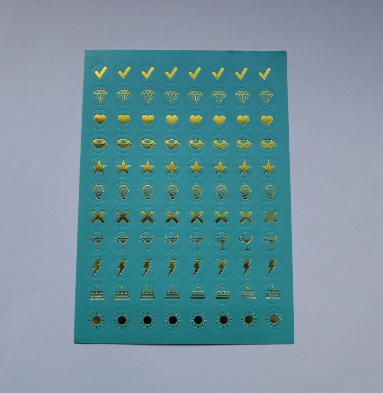 Groene sheet met kleine ronde stickers