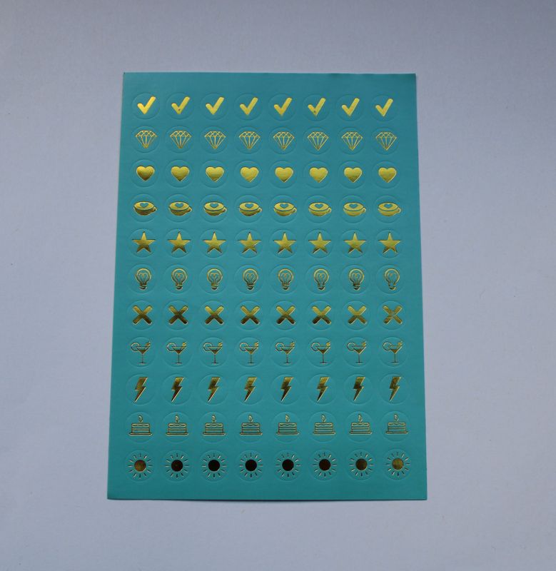 Groene sheet met kleine ronde stickers