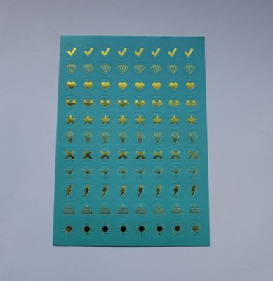 Groene sheet met kleine ronde stickers